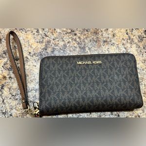 Michael Kors ladies wallet with wrist strap